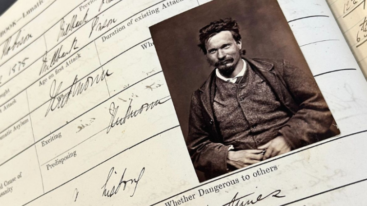 Photograph of a case note from Perth Prison, showing handwritten notes and the image of a male patient