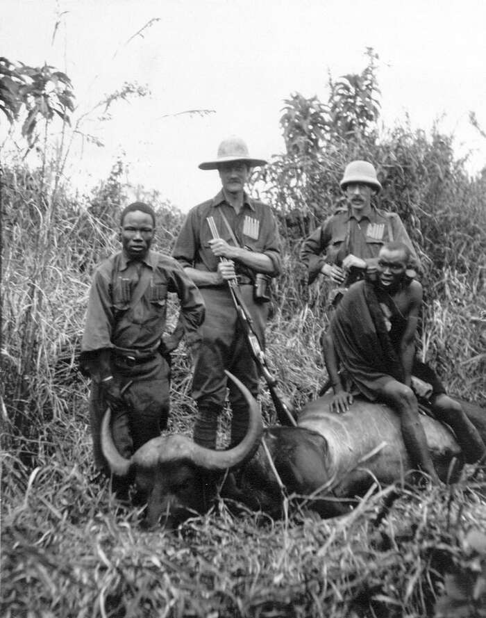 Hunters and Masai with a buffalo, Kenya, 1910