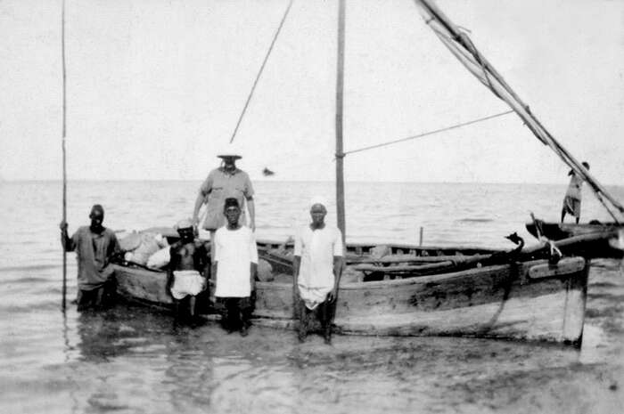 Boat's crew on a fishing trip to Coral Island off Tanzanian Coast