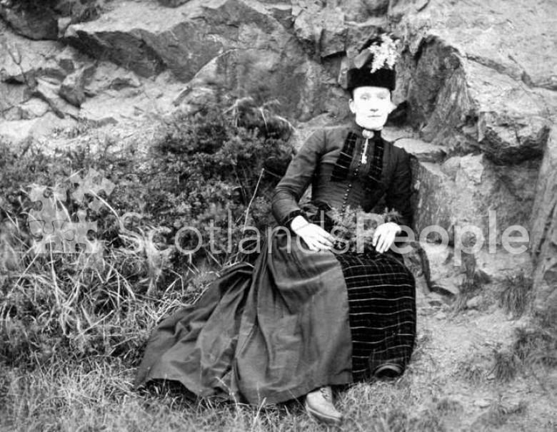 Woman outdoors, c 1915