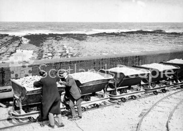 Wagons filled with concrete materials at Gardenstown Harbour, 1913