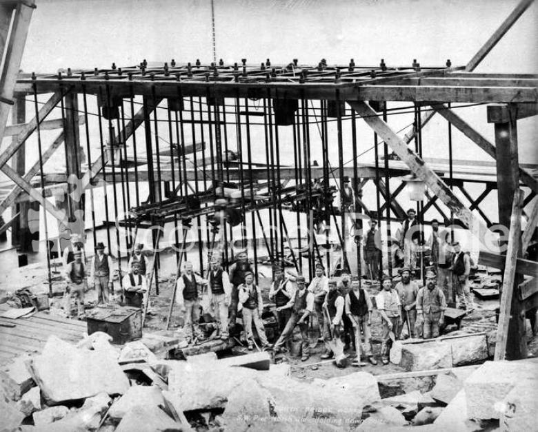 Workers by Forth Bridge pier during construction, 1884