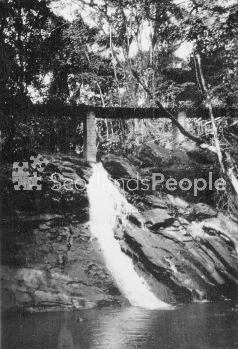 Waterfall, with a view of Nsek Bridge after construction, Cameroon