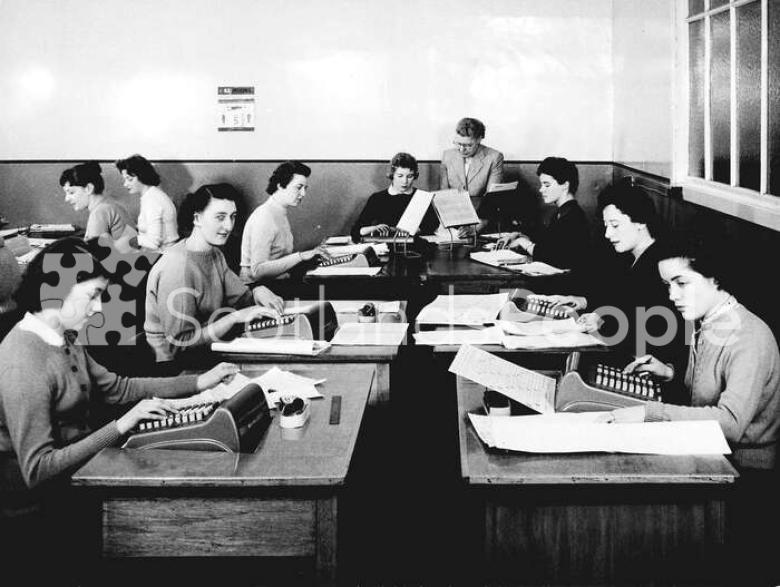 Office staff using comptometers, c1950s