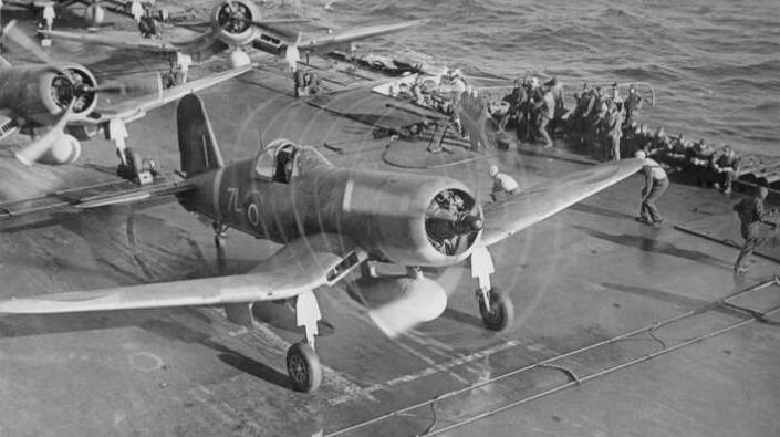 Fighter bomber taking off from carrier, 1944