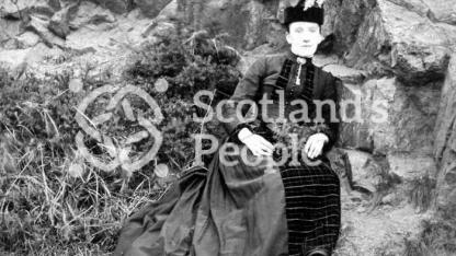 Woman outdoors, c 1915