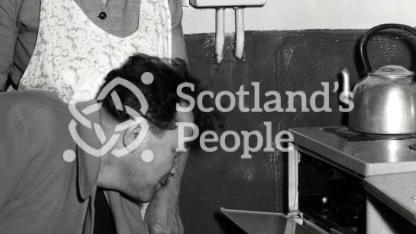 Soviet delegate in miner's home near Alloa, 1960s Soviet delegate in miner's home near Alloa, 1960s
