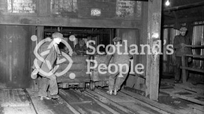 Miners with coal wagons at Glencraig Colliery Miners with coal wagons at Glencraig Colliery