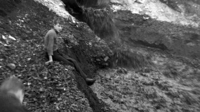 Boy on coal bing, Fife, 1935