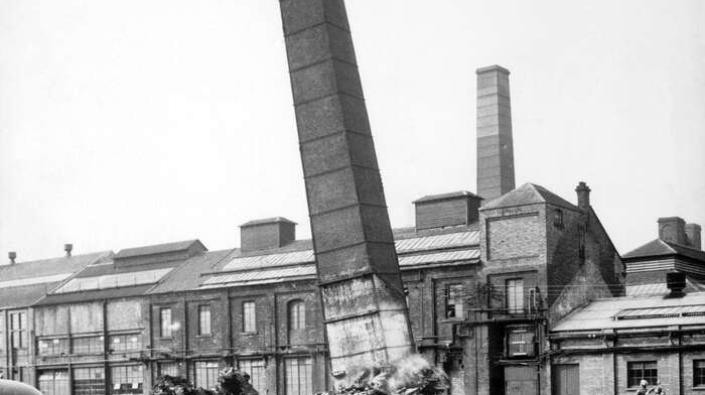 Chimney collapsing, Carron Works, 20th century