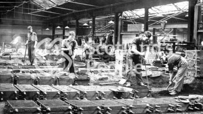 Workmen lining moulds at Carron Works, 20th century Workmen lining moulds at Carron Works, 20th century