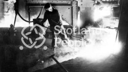 Workman with ladle at Carron Works, 20th century Workman with ladle at Carron Works, 20th century