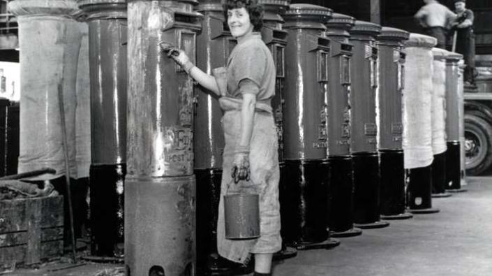 Painting pillar boxes, 1950s