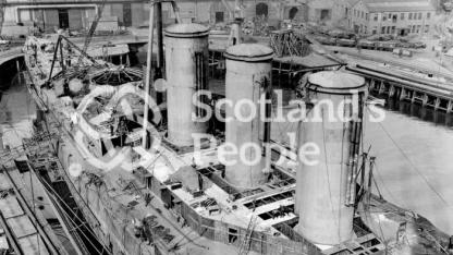 HMS Tiger, Royal Navy Tiger-Class Battlecruiser: View amidships looking down on the three funnels towards the bow HMS Tiger, Royal Navy Tiger-Class Battlecruiser: View amidships looking down on the three funnels towards the bow