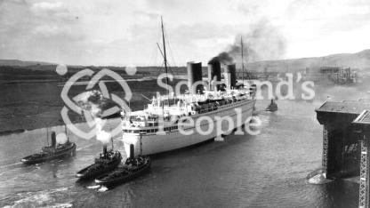 The Canadian Pacific Line ocean liner the RMS Empress of Britain on the River Clyde leaving Clydebank The Canadian Pacific Line ocean liner the RMS Empress of Britain on the River Clyde leaving Clydebank
