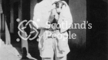'James, my Assyrian bearer and Boggins the Bolshevik pup' 'James, my Assyrian bearer and Boggins the Bolshevik pup'