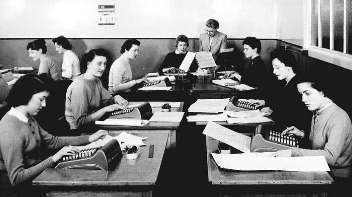 Office staff using comptometers, c1950s