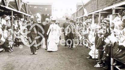 Queen Mary greeted by the crowd