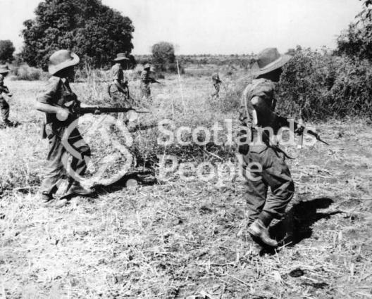 British soldiers advancing through countryside in South East Asia, c 1944-1945 British soldiers advancing through countryside in South East Asia, c 1944-1945