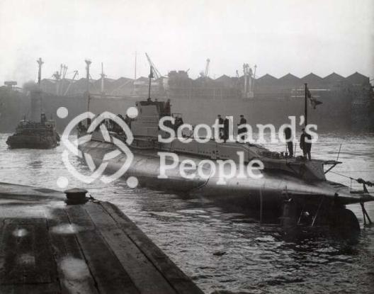 Submarine in shipyard basin, c 1944 Submarine in shipyard basin, c 1944