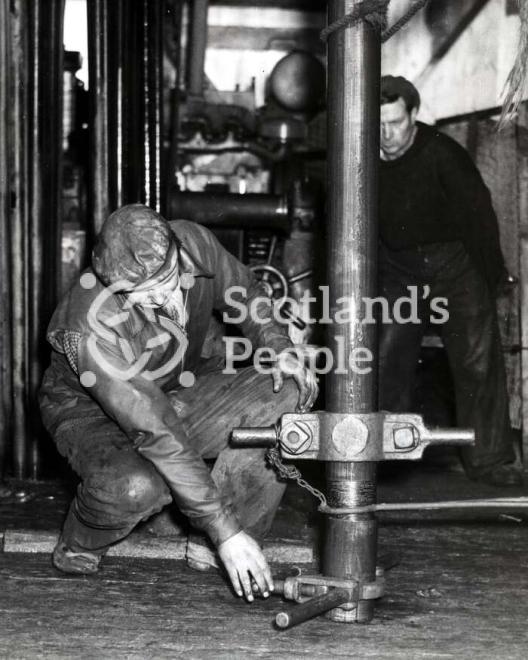Men working on a boring tower in the Forth, 1955 Men working on a boring tower in the Forth, 1955