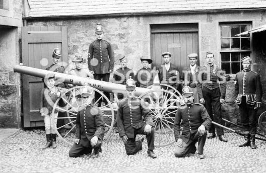 Volunteer firemen and estate workers with a pump mounted on wheels, c 1905 Volunteer firemen and estate workers with a pump mounted on wheels, c 1905