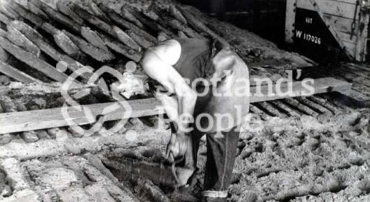 Worker at Carron Works, 20th century Worker at Carron Works, 20th century