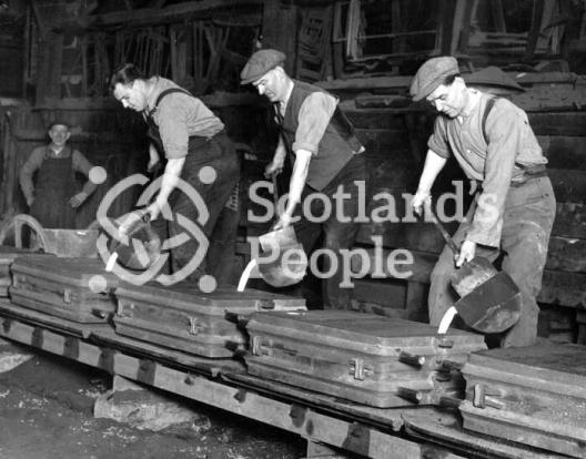 Filling moulds at Carron Works, 20th century Filling moulds at Carron Works, 20th century