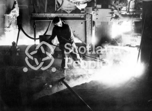 Workman with ladle at Carron Works, 20th century Workman with ladle at Carron Works, 20th century