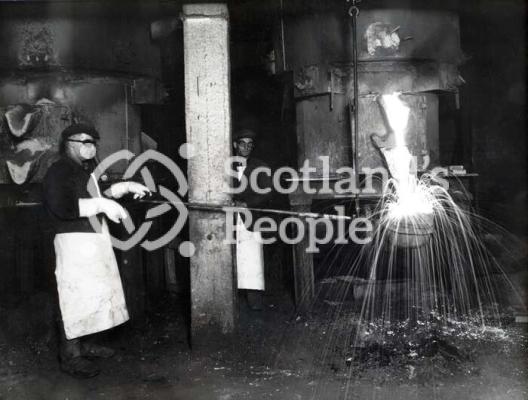 Workmen filling ladle at Carron Works, 20th century Workmen filling ladle at Carron Works, 20th century