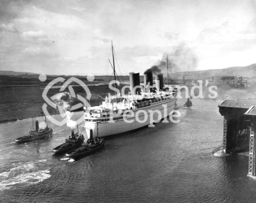 The Canadian Pacific Line ocean liner the RMS Empress of Britain on the River Clyde leaving Clydebank The Canadian Pacific Line ocean liner the RMS Empress of Britain on the River Clyde leaving Clydebank