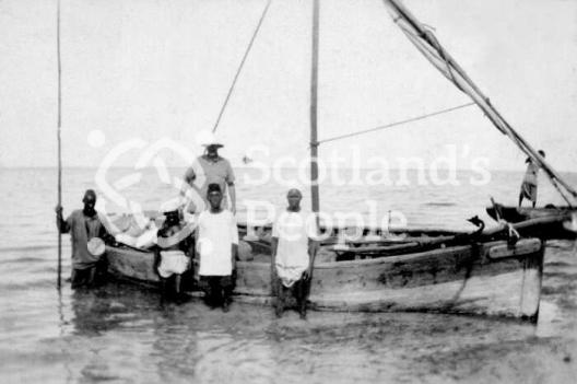 Boat's crew on a fishing trip to Coral Island off Tanzanian Coast Boat's crew on a fishing trip to Coral Island off Tanzanian Coast