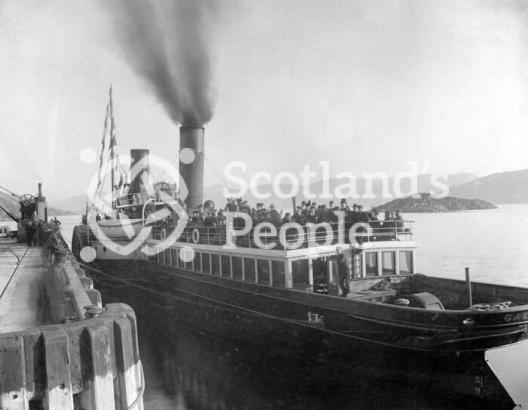 A paddle steamer at Kyle of Lochalsh pier about to sail to Skye A paddle steamer at Kyle of Lochalsh pier about to sail to Skye