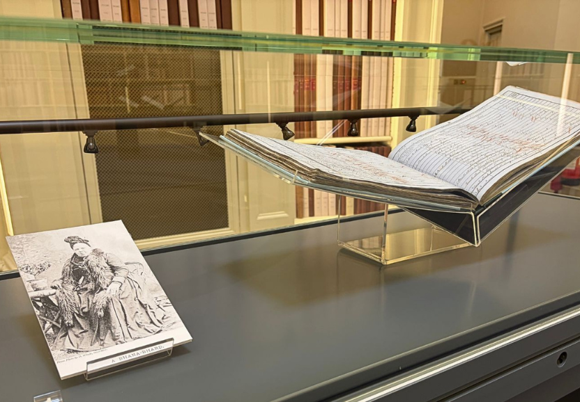 Display cabinet showing black and white archival photograph of Gaelic poet Mary MacPherson (known as Màiri Mhór nan Òran) and original records tracing moments in the poet's life.