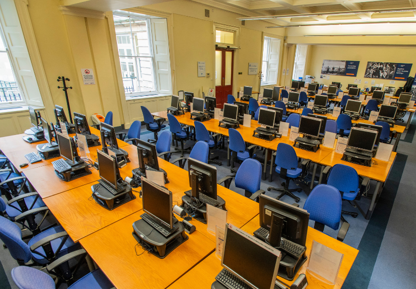 Interior of the Scotland's People Centre in Edinburgh, showing rows of computers on desks with natural light coming through the windows