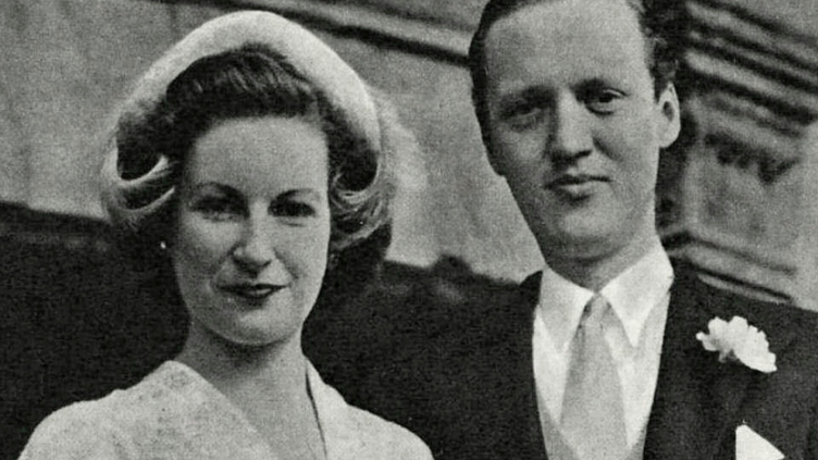 Black and white image of a bride and groom.