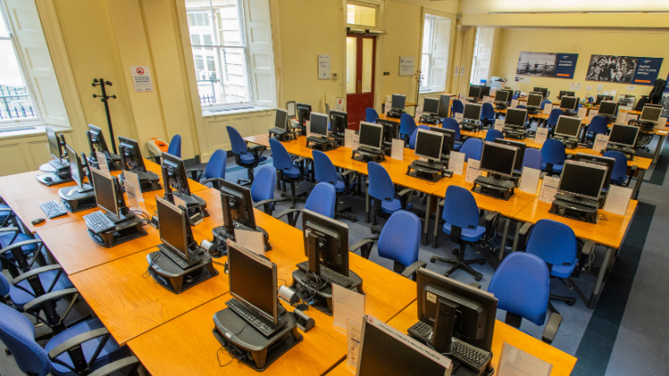 Interior of the Scotland's People Centre in Edinburgh, showing rows of computers on desks with natural light coming through the windows