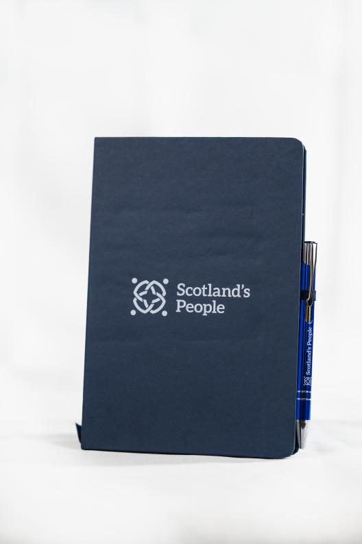 Notebook and pen in navy with the Scotland's People logo
